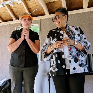 Patti Gunderson of the Pacific Northwest National Laboratory talks windows with HUD Secretary Marcia Fudge at the Innovative Housing Showcase on the National Mall on Friday.