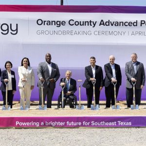 Texas regulators (first four on left) join Texas Gov. Greg Abbott (fourth from right) and Entergy senior officials for groundbreaking of the utility's Orange County Advanced Power Station.