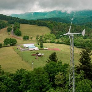 A Bergey Windpower Excel15 is shown in an agricultural setting