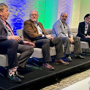 From left, Mark Gabriel, United Power, speaks, as Larry Bekkedahl, Portland General Electric; Hani Alarian, CAISO, and Ann Moore, AVEVA, listen.