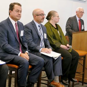 Moderator Michael Tomsu, a partner with Vison & Elkins, introduces his panel during EBA's Texas Energy Symposium (left to right): Alison Silverstein, Silverstein Consulting; Todd Staples, Texas Oil & Gas Association; Bill Barnes, NRG Energy; and Liz Jones, Oncor.