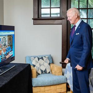 President Biden watches as the U.S. House of Representatives passes the Inflation Reduction Act on Friday.