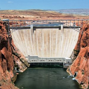 Lake Powell, which provides water to power the Glen Canyon dam, is seeing water levels at historic lows, cutting power production at the dam by 16%, according to the Bureau of Reclamation.