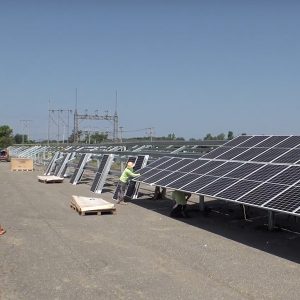 A solar array being installed on the SUNY Fredonia campus, for which the distribution utility, National Grid, will credit the school for all electricity produced.