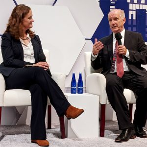 DOE Under Secretary David Crane (right) talks industrial decarbonization with Lindsey Griffith of the Clean Air Task Force at the recent Clean Industrial Summit.