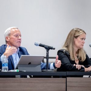 Michael Richard (left), of the Maryland Public Service Commission (PSC), and Pamela Quinlan, principal of GQ New Energy Strategies, moderated a discussion on RTO governance during the Organization of PJM States Inc. annual meeting on Oct. 17.