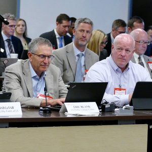 From left: Western commissioners Thad LeVar (Utah), Eric Blank (Colorado) and Kevin Thompson (Arizona) observe the Regional State Committee meeting.