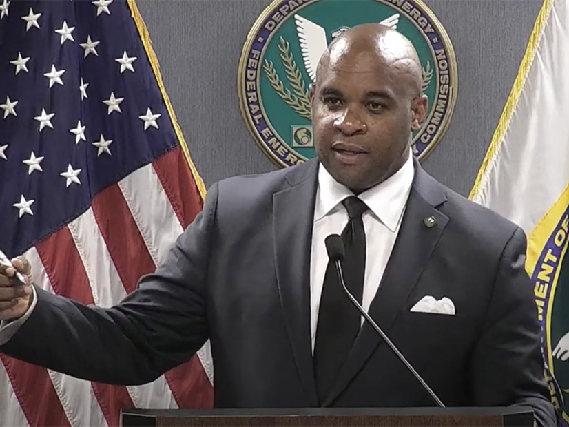 FERC Chair Willie Phillips takes questions from reporters after the commission approved Orders 1920 and 1977.