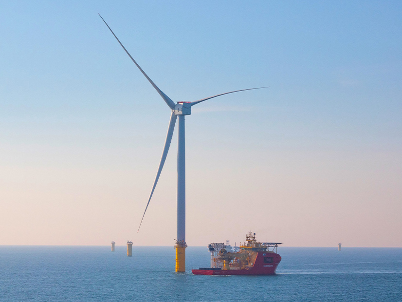 A GE Vernova wind turbine with LM Wind Power blades is shown in late 2023 at the Dogger Bank Wind Farm under construction off the English coast.