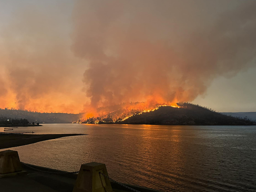 The Thompson Fire in burning near Lake Oroville has prompted the shutdown of PG&E transmission lines and the California Department of Water Resources' Hyatt hydroelectric plant.