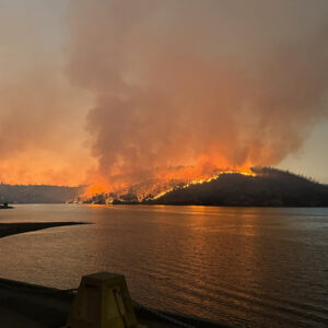 The Thompson Fire in burning near Lake Oroville has prompted the shutdown of PG&E transmission lines and the California Department of Water Resources' Hyatt hydroelectric plant.