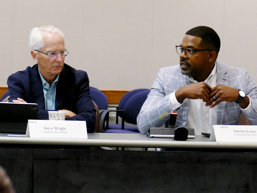 SPP's Antoine Lucas (right) addresses the MPEC during its July meeting as Director Steve Wright listens.