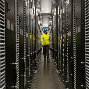 A New York Power Authority construction engineer walks through a newly commissioned battery storage unit in northern New York in 2023.