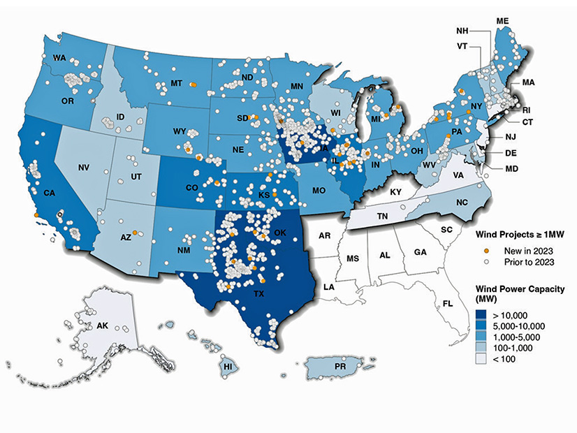 Yellow dots indicate new large-scale wind projects generation that came online in 2023; white dots indicate existing facilities.