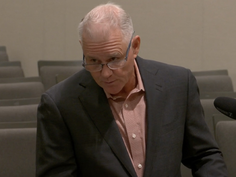 Scott Wetch, a lobbyist representing the California Coalition of Utility Employees and the California Association of Electrical Workers, speaks during a California Senate hearing on Aug. 6.