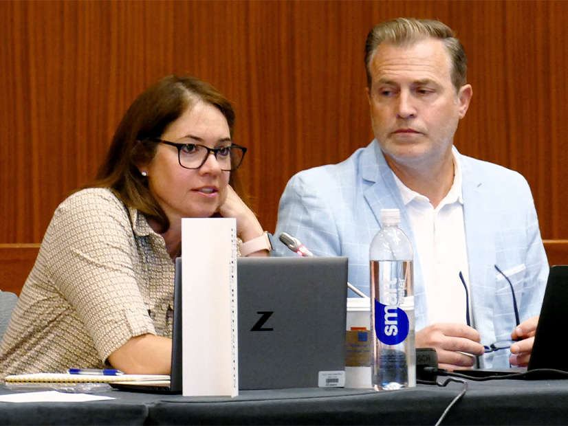 Evergy's Denise Buffington makes her point as SPP COO Lanny Nickell listens during a recent REAL Team meeting.