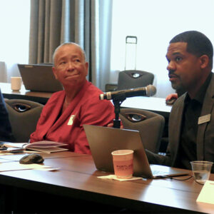 From left: IMIP members Steve Wright and Elizabeth Moore listen to SPP's Antoine Lucas.