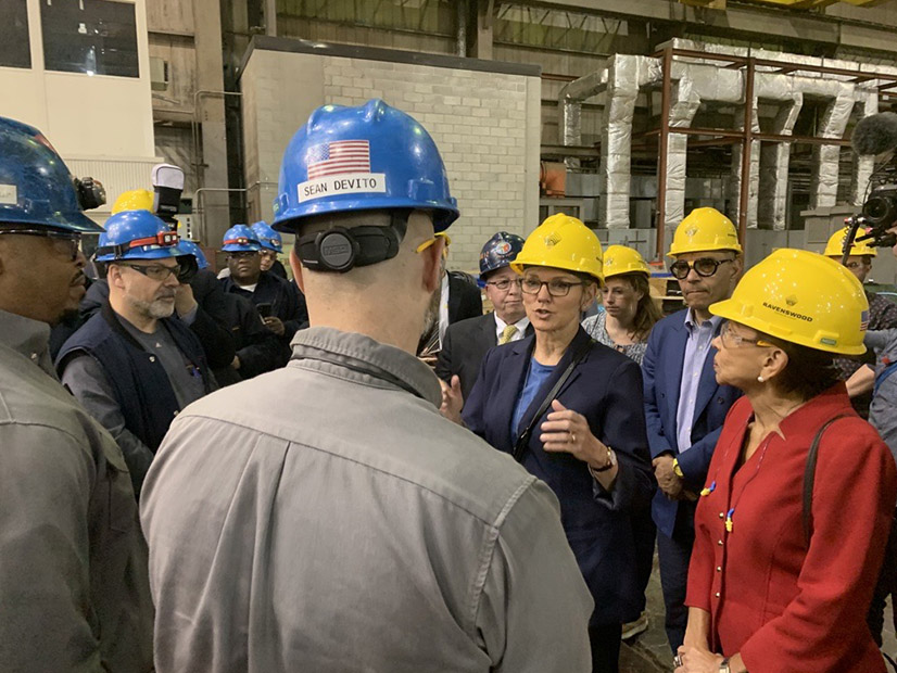 U.S. Energy Secretary Jennifer Granholm, center, speaks in April 2023 at a fossil-fired New York City power plant that would be converted to a landing site for offshore wind export cables as part of the Attentive Energy One proposal.