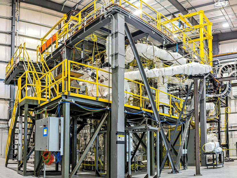 Google has announced the world's first corporate agreement to buy electricity from purpose-built small modular reactors in development by Kairos Power. The Kairos molten sale pumping unit is shown during a test phase.