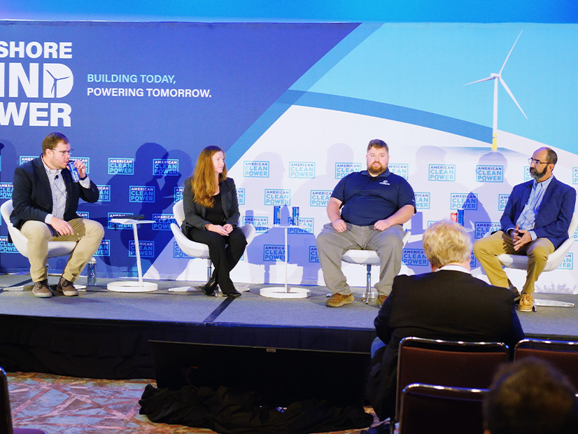 From left: Ed Anthes-Washburn of Coast Line Transfers, Crista Bank of Vineyard Offshore, Michael Quinn of Shoreline Offshore and Mike Theiler of Quintham discuss fishing and offshore wind at the American Clean Power Association's Offshore WINDPOWER 2024 conference in Atlantic City, N.J., on Oct. 30.