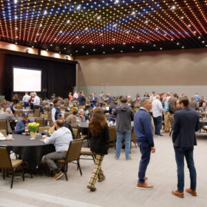 Attendees mingle during a break at the New York Solar Energy Industries Association 2024 Solar Summit on Nov. 7 in Albany, N.Y.