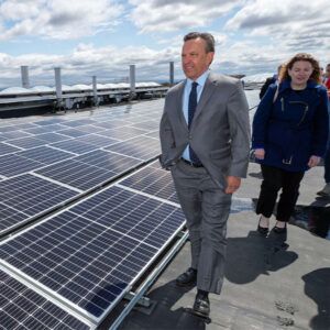 NYPA President Justin Driscoll walks through a 1.9-MW rooftop solar array the authority developed at the University at Albany in 2022. NYPA is gearing up to develop larger renewables projects than those it traditionally has undertaken.