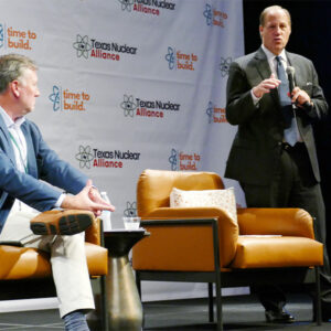 PUC Commissioner Jimmy Glotfelty (right), with Texas Nuclear Alliance President Reed Clay, details the report's recommendations during the Texas Nuclear Summit.