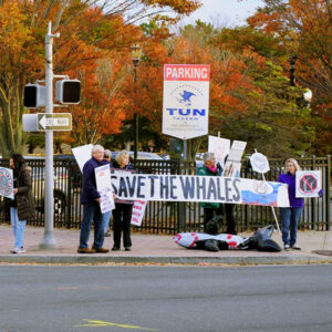 Offshore wind opponents greet people arriving at Offshore WINDPOWER in Atlantic City, N.J., on Oct. 29.