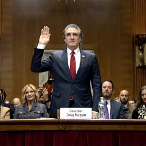 Former North Dakota Gov. Doug Burgum, nominee for interior secretary, is sworn in at his confirmation hearing before the Senate Energy and Natural Resources Committee on Jan. 16.