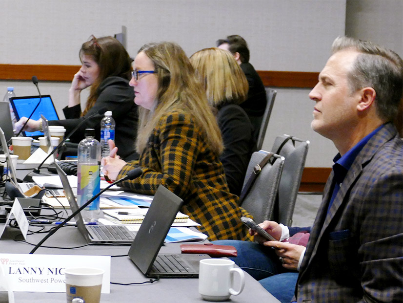 Lanny Nickell (right) listens to the REAL Team's discussion the day after being selected as SPP's next CEO. 