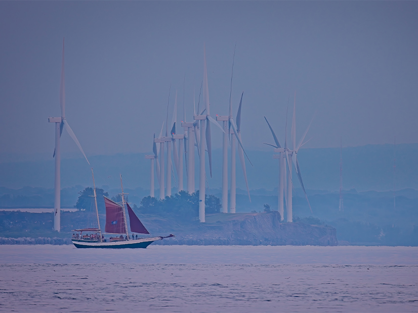 Wind turbines line the Lake Erie shoreline in Lackawanna, N.Y.