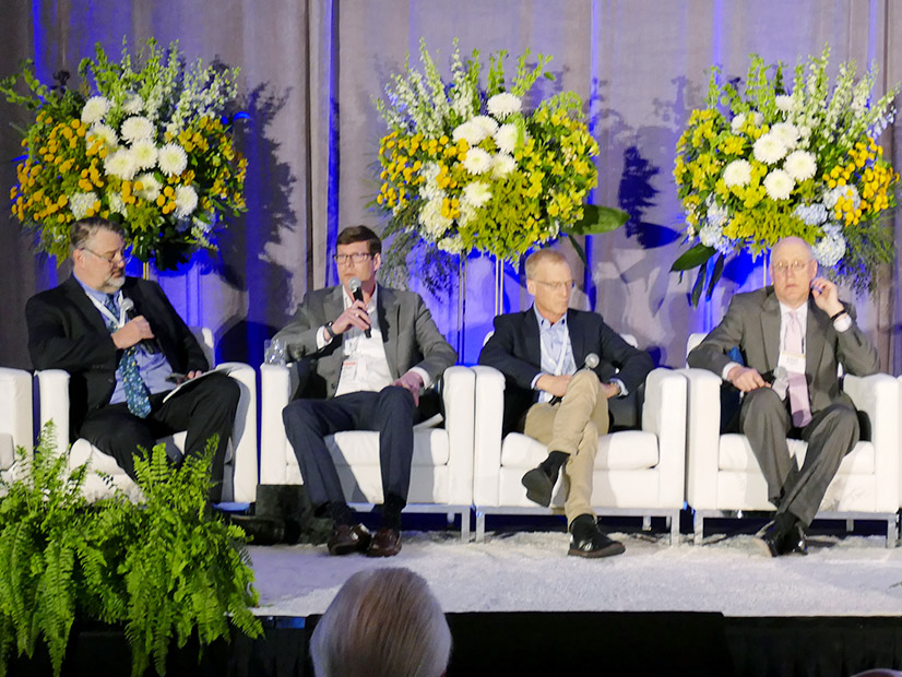 Idaho Public Utilities Commissioner John Hammond, McGuireWoods' John Ellis, Georgetown University professor Howard Shelanski and FERC Solicitor Robert Solomon at NARUC